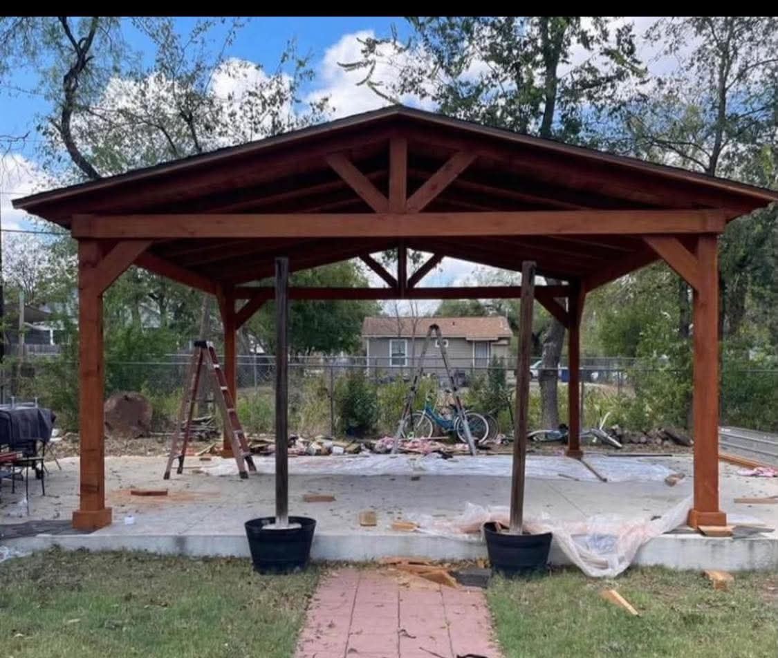 Finished wood pavilion with gabled roof